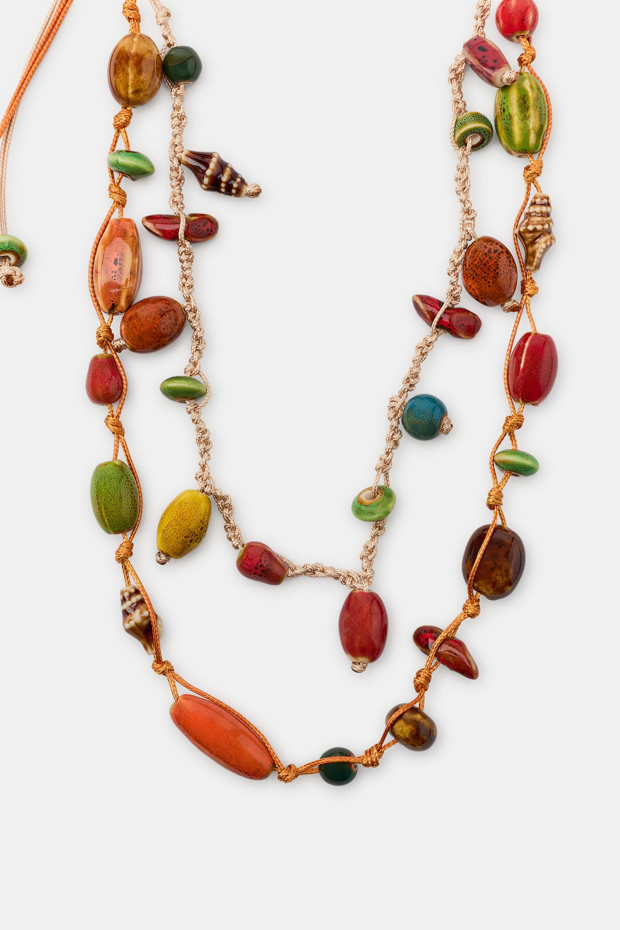 COLLIER DOUBLE LACET PIÈCES CÉRAMIQUE